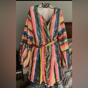 Sequin wrap dress . Get the party started .